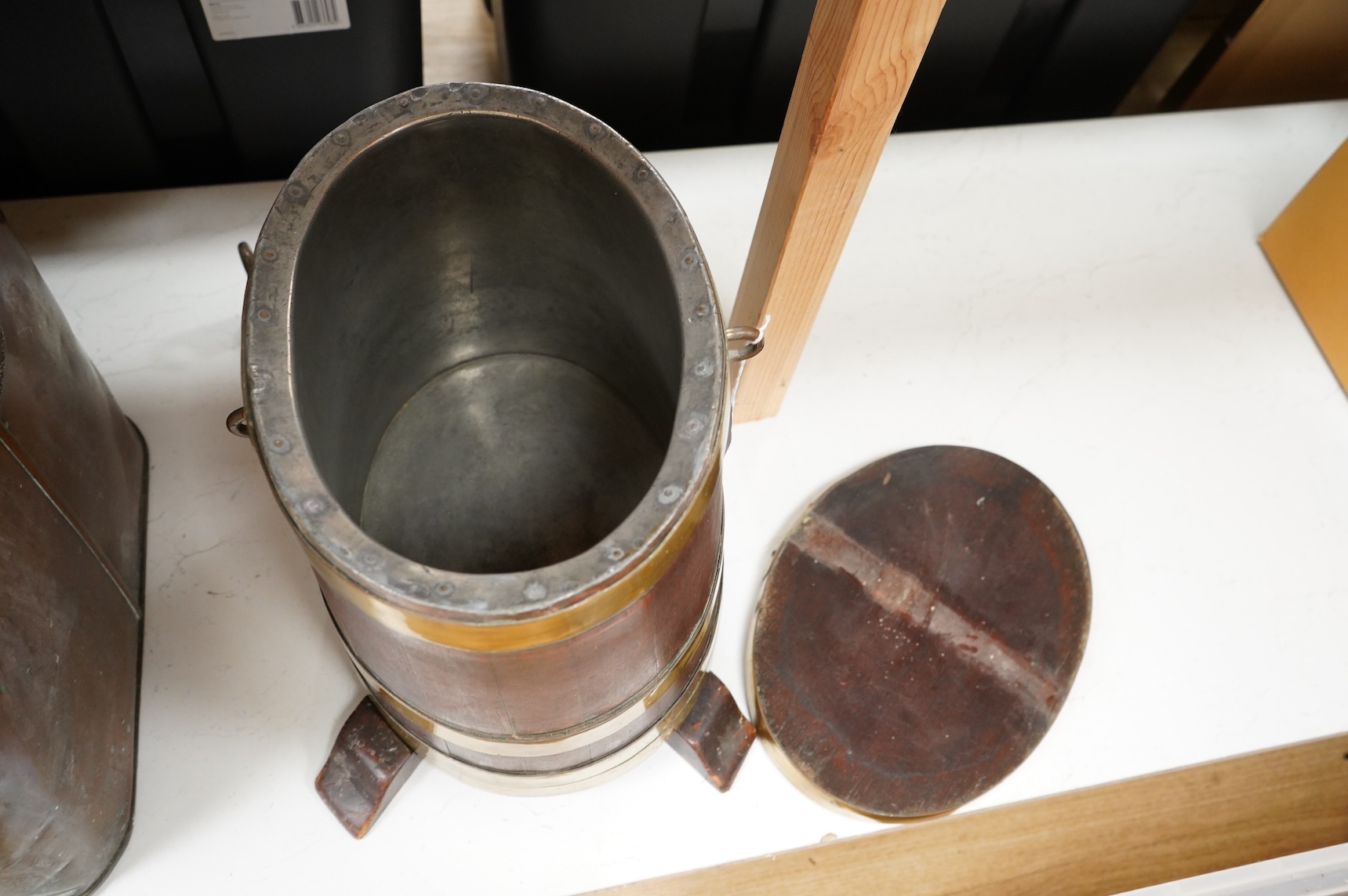 A 19th century teak and brass bound navy rum barrel on stand, 34cm high